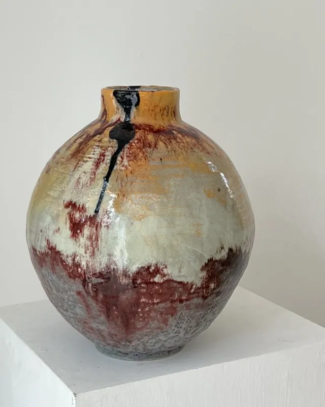 A red and ochre dripped Touches vase