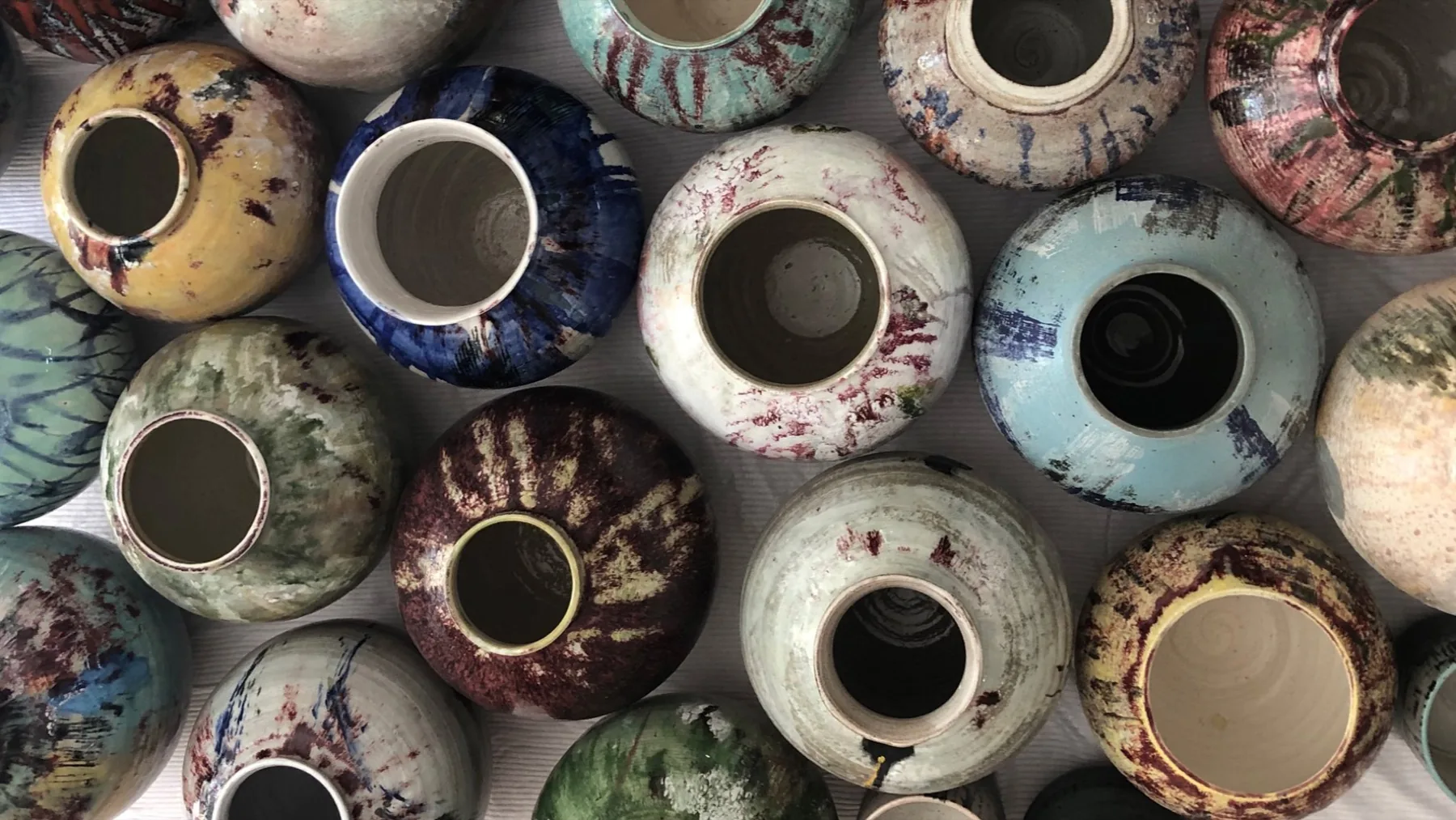 Overhead view of many Touches vases together